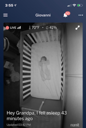Gio asleep in his crib.